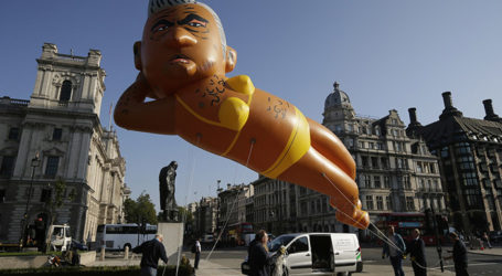 London Protestors Mock Mayor Sadiq Khan in “Yellow Bikini” Blimp